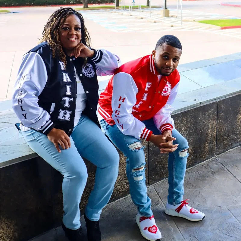 Owners Wearing Black & Red Christian Varsity Jackets